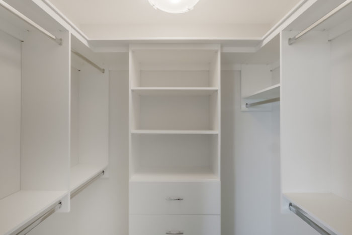 A closet with organizers